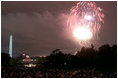 Although dark clouds rained on everybody's parade in Washington D.C., the sky opened up just in time for a firey spectacle set to patriotic music performed by the National Symphony Orchestra July 4, 2001.