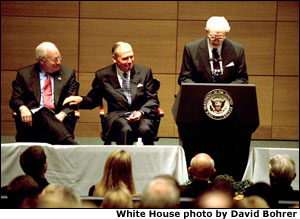 Vice President Dick Cheney and Jon Huntsman listen to an introduction by Gordan B. Hinckley during the dedication ceremony of Jon Huntsman Hall at the University of Pennsylvania's Wharton School of Business in Philadelphia, Pa., Oct. 25, 2002. "(Jon Huntsman) has to rank among the most successful and public-minded citizens any place in our nation," said the Vice President during his remarks about his friend of more than 30 years. "In every setting -- public, private, and personal -- I've found him to be one of the people I most admire, a man of discernment, of character, and humanity." White House photo by David Bohrer.