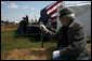 Vice President Dick Cheney delivers remarks during the commemoration of the 145th anniversary of the Battle of Chickamauga in McLemore's Cove, Georgia. as a Confederate re-enactment participant looks on. White House photo by David Bohrer