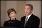 President George W. Bush gives remarks on the death of Pope John Paul II with First Lady Mrs. Laura Bush at the White House on Saturday April 2, 2005. White House photo by Paul Morse