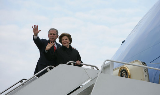 President George W. Bush and Mrs. Laura Bush wave from Air Force One as they board the aircraft Friday, Feb. 15, 2008, at Andrews Air Force Base en route to Benin, the first stop on their five-country, African visit. White House photo by Chris Greenberg