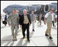 Vice President Dick Cheney walks with General David Petraeus, Commander of U.S. forces in Iraq, upon arrival to Baghdad Wednesday, May 9, 2007. The Vice President began a trip to the Middle East with an unannounced visit to Iraq to meet with Iraqi officials and U.S. leadership. White House photo by David Bohrer