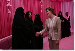 Mrs. Laura Bush meets one-on-one with women in the Pink Majlis Monday, Oct. 22, 2007, at the Sheikh Khalifa Medical Center in Abu Dhabi, United Arab Emirates. The Majlis is a tradition of open forum for a wide range of topics. The Majlis focuses issues related to breast cancer. White House photo by Shealah Craighead