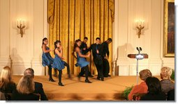 Ritmo en Accion, from Jamaica Plain, Massachusetts, performs during the Coming Up Taller awards ceremony Monday, Jan. 28, 2008, in the East Room of the White House. The youth dance initiative was created in 2001 by the Hyde Square Task Force to combat high crime, violence and low student achievement in its tough, inner-city Boston neighborhood.  White House photo by Shealah Craighead
