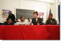 Laura Bush addresses young boys participating in the Passport to Manhood program taught by male staff members at the Germantown Boys and Girls Club Tuesday, Feb. 3, 2005 in Philadelphia. Passport to Manhood promotes and teaches responsibility through a series of classes for male club members ages 11-14.  White House photo by Susan Sterner