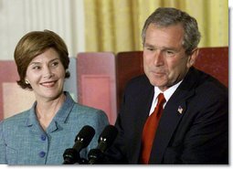 President George W. Bush and Laura Bush discuss the importance of involving familiesand teachers to help children read at an early age in the East Room Wednesday, April 3. Promoting the Early Childhood Education Initiative, Mrs. Bush is the honorary national chairperson of the PBS Designated Reader campaign. After their remarks, the audience of adults and children were visited by Mister Rogers and Elmo from Sesame Street. White House photo by Evan Parker.