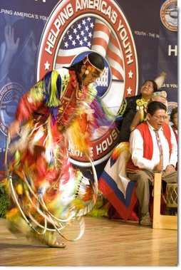 A member of The Seven Falls Indian Dancers performs during the second regional Helping America's Youth Conference on Friday, August 4, 2006, in Denver, Colorado. The dancers are from the Pawnee, Flandreau Santee-Sioux Crow Creek Sioux, and Cheyenne River Sioux tribes. The troupe has been dancing throughout Colorado for over 25 years. White House photo by Shealah Craighead