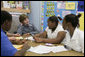 Mrs. Laura Bush talks with students during her tour of the New Orleans Charter Science and Mathematics High School Thursday, April 19, 2007, in New Orleans, La. White House photo by Shealah Craighead