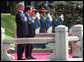 President George W. Bush and President Myung-bak Lee of the Republic of Korea, pause for their respective national anthems Wednesday, Aug. 6, 2008, during arrival ceremonies for President Bush and Mrs. Laura Bush in Seoul. White House photo by Chris Greenberg