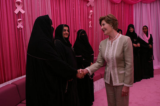 Mrs. Laura Bush meets one-on-one with women in the Pink Majlis Monday, Oct. 22, 2007, at the Sheikh Khalifa Medical Center in Abu Dhabi, United Arab Emirates. The Majlis is a tradition of open forum for a wide range of topics. The Majlis focuses on issues related to breast cancer. White House photo by Shealah Craighead