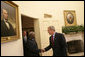 Meeting with the leaders from Mozambique, Botswana, Niger, Ghana and Namibia, President George W. Bush welcomes President Armando Guebuza of Mozambique to the Oval Office Monday, June 13, 2005. The leaders discussed a range of topics, including AGOA. "All the Presidents gathered here represent countries that have held democratic elections in the last year," said President Bush. "What a strong statement that these leaders have made about democracy and the importance of democracy on the continent of Africa." White House photo by Eric Draper