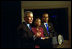 President George W. Bush discusses Global and Domestic HIV and AIDS during a meeting in the Dwight D. Eisenhowser Executive Office Building Jan. 31, 2003. Pictured with the President are Ambassodor Edith Ssempala of Uganda, center, and Ambassador Odeen Ishmael of Guyana.