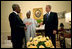 President George W. Bush hosts a visit by United Nations Secretary General Kofi Annan and Nigerian President Olusegun Obasanjo to the Oval Office May 11, 2001. President Bush discussed a strategy to halt the spread of AIDS and other infectious diseases across the African continent and the world. President Bush pledged U.S. support for the Global HIV/AIDS fund and jump-started the fund with the first contribution. The United States is the largest major contributor to the fund, which has now reached $500 million.