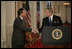 President George W. Bush shakes hands with his Supreme Court Justice Nominee John Roberts after his remarks on the State Floor of the White House, Tuesday evening, July 19, 2005.