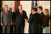 President George W. Bush looks on during the swearing-in ceremony for U.S. Supreme Court Justice Samuel A. Alito, Tuesday, Feb. 1, 2006 in the East Room of the White House, sworn-in by U.S. Supreme Court Chief Justice John Roberts. Alito's wife, Martha-Ann, their son Phil and daughter, Laura, are seen to the right.