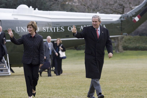 President George W. Bush and Laura Bush arrive on the South lawn at the White House returning from delivering remarks on the 2006 agenda in Nashville, Tennessee, Wednesday, Feb. 1, 2006. White House photo by Shealah Craighead