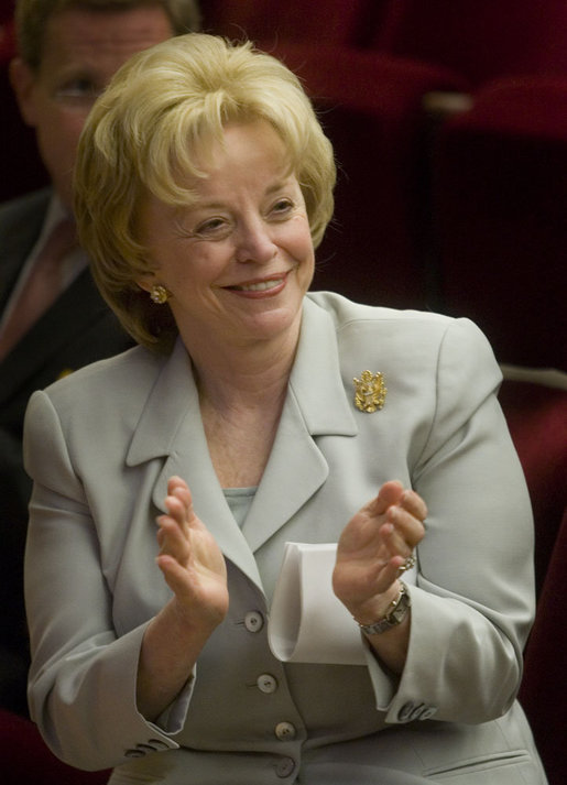 Mrs. Lynne Cheney applauds the group of naturalized American citizens as they stand to participate in the swearing in ceremony during a special naturalization ceremony at the National Archives Tuesday, April 17, 2007, in Washington, D.C. 