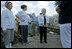 Mrs. Cheney talks with surviving residents of one Gulfport, Mississippi neighborhood during a walking tour of the Hurricane Katrina damaged areas Thursday, September 8, 2005.