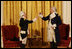 General George Washington (played by Dean Malissa) and General Marie Joseph Paul Yves Roch Gilbert du Motier, the Marquis de LaFayette (played by Benjamin Goldman), toast each other at the beginning of their dialogue Tuesday, Nov. 6, 2007, during the entertainment in the East Room following a dinner in honor of President Nicolas Sarkozy at the White House.