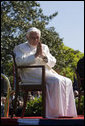 Pope Benedict XVI acknowledges guests Wednesday, April 16, 2008, during the arrival ceremony for the Pope on the South Lawn of the White House. Said Pope Benedict XVI during the ceremony, "Mr. President, dear friends, as I begin my visit to the United States, I express once more my gratitude for your invitation, my joy to be in your midst, and my fervent prayers that Almighty God will confirm this nation and its people in the ways of justice, prosperity and peace." White House photo by David Bohrer