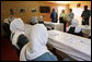 Mrs. Laura Bush and Governor Habiba Sarabi, in white, meet with female police trainees who will graduate June 15th from Non-Commissioned Officer Training during a visit Sunday, June 8, 2008, to the Police Training Academy in Bamiyan, Afghanistan. White House photo by Shealah Craighead