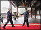 President George W. Bush is welcomed by China's President Hu Jintao upon his arrival Sunday, Aug. 10, 2008 to Zhongnanhai, the Chinese leaders compound in Beijing. White House photo by Eric Draper