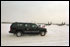 Although arriving amidst cold, blowing snow, President George W. Bush is greeted warmly at Alaska's Elmendorf Air Force Base, Saturday, Feb. 16, 2002. White House photo by Paul Morse.