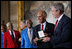 President George W. Bush presents the Congressional Gold Medal Dr. Roscoe Brown Jr., during ceremonies honoring the Tuskegee Airmen Thursday, March 29, 2007, at the U.S. Capitol. Dr. Brown, Director of the Center for Urban Education Policy and University Professor at the Graduate School and University Center of the City University of New York, commanded the 100th Fighter Squadron of the 332 Fighter Group during World War II. White House photo by Eric Draper