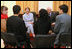 Mrs. Laura Bush is joined by Afghan Foreign Minister Rangeen Dadfar Spanta, center right, for a meeting with Afghan teachers and students, Sunday, June 8, 2008, during an unannounced visit to Kabul. Attending the meeting were representatives from Kabul University, American University of Afghanistan, International School of Kabul and the Women's Teacher Training Institute.