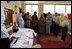 Mrs. Laura Bush speaks with Afghan women entrepreneurs during her visit to the marketplace of Arzu and Bamiyan Women's Business Association Sunday, June 8, 2008, in Afghanistan.