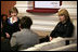 Mrs. Laura Bush and Mrs. Kateryna Yushchenko, wife of Ukrainian President Viktor Yushchenko, participate in a tea with breast cancer advocates and survivors Tuesday, April 1, 2008, at the Diplomatic Academy in Kyiv.