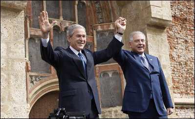 President George W. Bush and Prime Minister Ivo Sanader of Croatia, raise hands together before thousands who flocked to St. Mark's Square in downtown Zagreb Saturday, April 5, 2008, to see and hear the U.S. President.