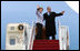 President George W. Bush and Mrs. Laura Bush wave as they board Air Force One Monday, March 31, 2008, for departure to Kyiv, Ukraine, the first stop on their European visit that will include the NATO Summit in Bucharest.