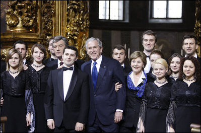 President George W. Bush and Mrs. Laura Bush pose for a photo with Ukrainian President Viktor Yushchenko and the Credo Chamber Choir Tuesday, April 1, 2008, after a musical performance at St. Sophia's Cathedral in Kyiv, Ukraine.