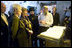 Mr. Mordechi Eliav leads Mrs. Laura Bush and Mrs. Aliza Olmert on a visit of the Western Wall in Jerusalem Wednesday, May 14, 2008.