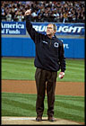 President George W. Bush throws out the first pitch during game three of the World Series game between the Arizona Diamondbacks and the Yankees at Yankee Stadium Oct. 3, 2001.