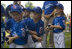 Members of the Cumberland, Maryland Bobcats look on during the presentation of game balls Wednesday, June 27, 2007, after their opening game of the 2007 White House Tee Ball season against the Luray, Virginia Red Wings on the South Lawn. 