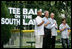 President George W. Bush is joined during the playing of the National Anthem by Roberto Clemente Jr., left, son of Hall of Famer Roberto Clemente; Angel Macias, who in 1957 became the only player to pitch a perfect game in Little League World Series history, and actor Jake T. Austin, right, who will portray Macias in an upcoming film about that game, seen together Monday, June 30, 2008, at Tee Ball on the South Lawn at the White House.