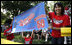  Tee Ball All-Star Joshua Miyazawa, age 5, gets a boost from his Hawaiian fan club as he plays on the South Lawn of the White House on July 16, 2008. The banner also holds a greeting for President George W. Bush, who watched the demonstration of teamwork and discipline from a nearby bleachers with Mrs. Laura Bush and the families of the children attending. One child represented each state and the District of Columbia and the teams were divided into Western, Central, Southern and Eastern teams, with Joshua playing on the Western Team.