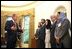 President George W. Bush meets with Afghan ministers in the Oval Office July 24, 2002. Pictured from left, are: Foreign Minister Abdullah Abdullah; Minister of Commerce Mustafa Kazemi; Minister of Health Suhaila Siddiq; Minister of Women’s Affairs Habiba Sorabi; Minister of Reconstruction Mohammad Amin Farhang; Minister of Higher Education Sharief Fayes; and Minster of Rural Development Mohammad Hanif Atmar.