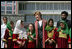 Mrs. Bush stands with a group of Afghan girls upon her arrival in Kabul, Afghanistan, Tuesday, March 29, 2005. 