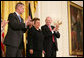 Donna Shalala is applauded by fellow recipients of the Presidential Medal of Freedom Thursday, June 19, 2008, as she is honored by President George W. Bush at ceremonies in the East Wing of the White House. White House photo by Shealah Craighead