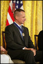 General Peter Pace receives applause after receiving the Presidential Medal of Freedom Thursday, June 19, 2008, during the Presidential Medal of Freedom ceremony in the East Room at the White House. White House photo by Shealah Craighead