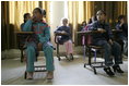 Students at the Discovery School of Swaifiyeh Secondary School in Amman, Jordan, participate in a classroom lesson during Laura Bush’s visit to the school Sunday, May 22, 2005.