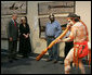 President George W. Bush enjoys a performance of Aboriginal song and dance during a visit Thursday, Sept. 6, 2007, to the Australian National Maritime Museum in Sydney. White House photo by Chris Greenberg