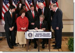 President George W. Bush signs H.R. 2669, the College Cost Reduction and Access Act, Thursday, September 27, 2007, in the Dwight D. Eisenhower Executive Office Building in Washington, D.C. The President is joined by Robert Garcia, a junior at the University of Texas, Laura Tappan, a sophomore at Northern Virginia Community College, Kalise Robinson, a junior at the University of the District of Columbia, Margie Clark, a student at Lord Fairfax Community College, Congressman Ric Keller of Florida, Congressman George Miller of California, Congressman John Spratt of South Carolina, and Secretary of Education Margaret Spellings. White House photo by Chris Greenberg