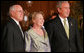 President George W. Bush stands with Prime Minister John Howard of Australia, and his wife, Janette Howard, after arriving at the Sydney Opera House Saturday, Sept. 8, 2007, for the APEC dinner. White House photo by Chris Greenberg