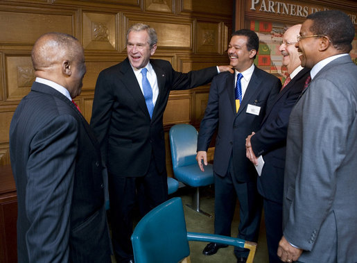 President George W. Bush pauses with fellow heads of state following a Roundtable on Democracy Tuesday, Sept. 25, 2007, at the United Nations in New York. From left are: President Festus Gontebanye Mogae of the Republic of Botswana; President Bush; President Leonel Fernandez of the Dominican Republic; Secretary of State for Foreign Relations Carlos Morales Troncoso of the Dominican Republic, and President Jakaya Kikwete of the United Republic of Tanzania. White House photo by Eric Draper