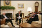 President George W. Bush, joined by Vice President Dick Cheney, meets with Health and Human Services Secretary Michael O. Leavitt in the Oval Office, Monday, Sept. 10, 2007, to talk about the Interagency Working Group on Import Safety's initial report and the group's next steps in enhancing the safety of imported products. White House photo by Joyce N. Boghosian