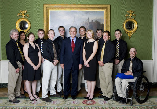 President George W. Bush stands with members of the University of Alaska-Fairbanks Men's and Women's Rifle Championship Team Friday, Sept. 21, 2007, at the White House during a photo opportunity with the 2006 and 2007 NCAA Sports Champions. White House photo by Chris Greenberg